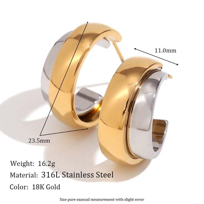 Statement Wave Oorringen — Goud & Zilver