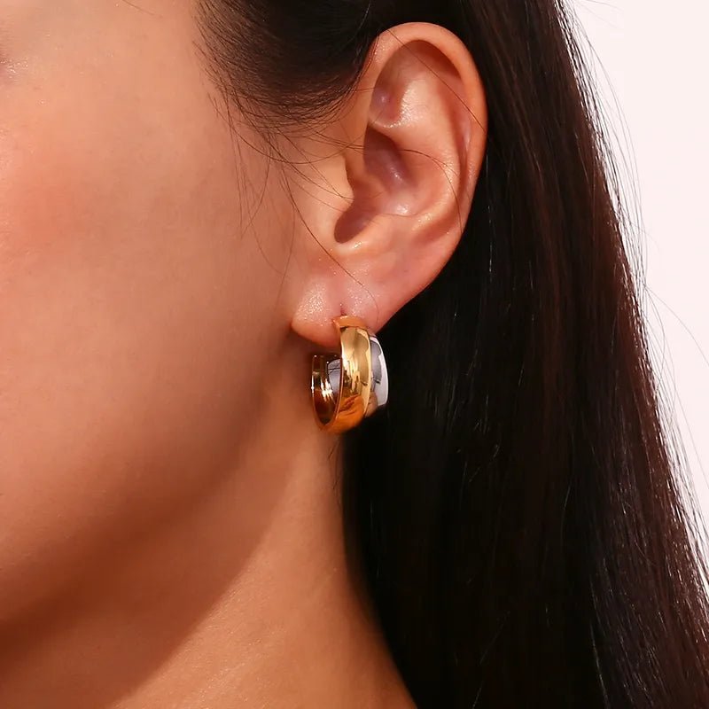 Statement Wave Oorringen — Goud & Zilver