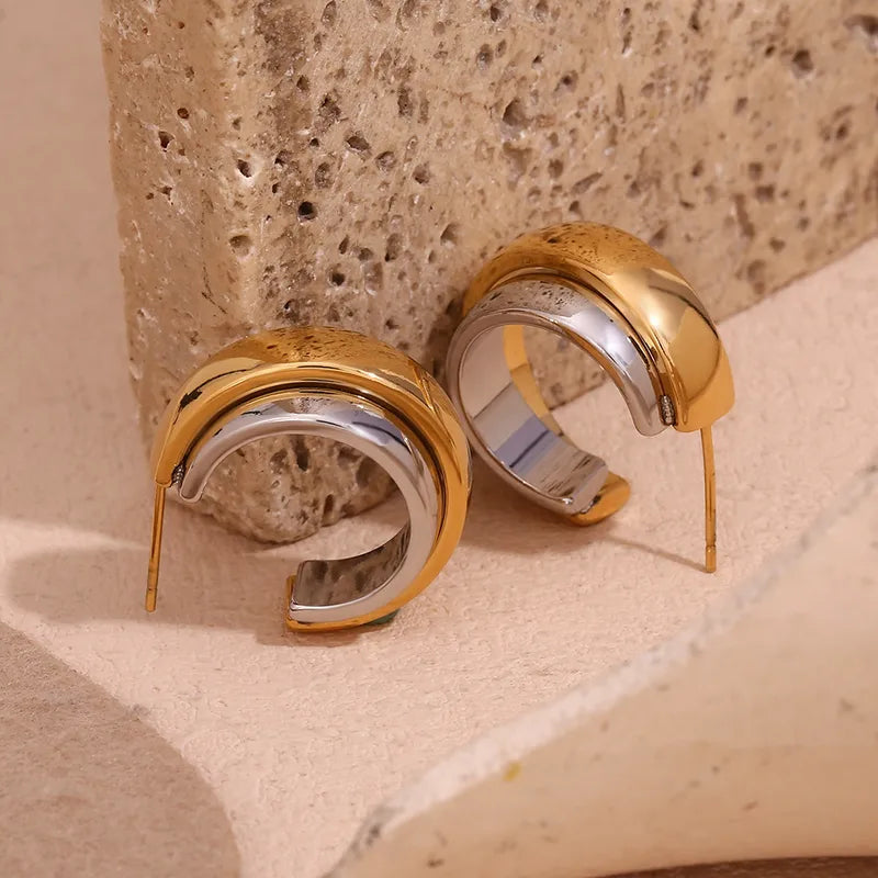 Statement Wave Oorringen — Goud & Zilver