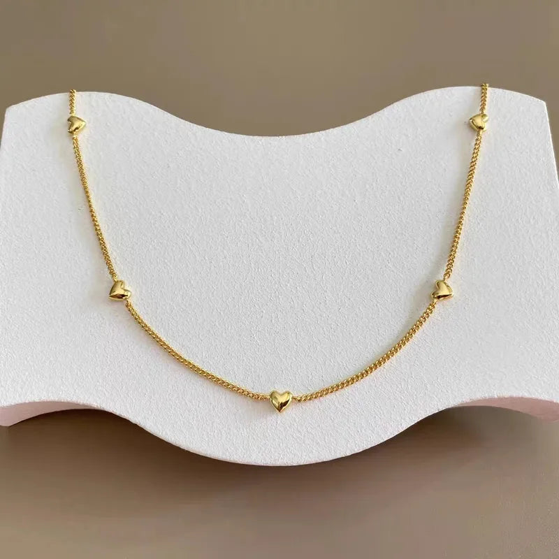 Minimalistische RVS Choker Ketting met Meerdere Hartjes (18K Goud Verguld)