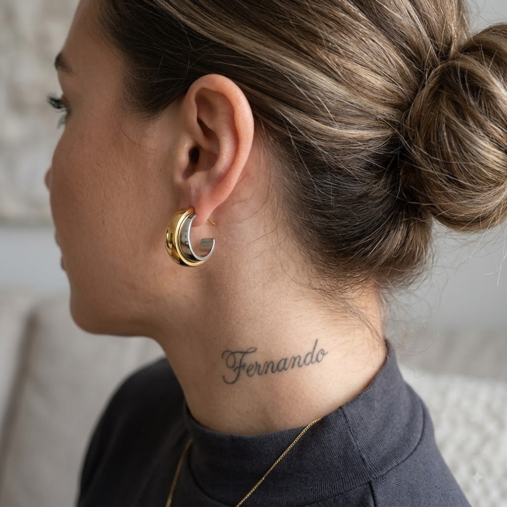 Statement Wave Oorringen — Goud & Zilver